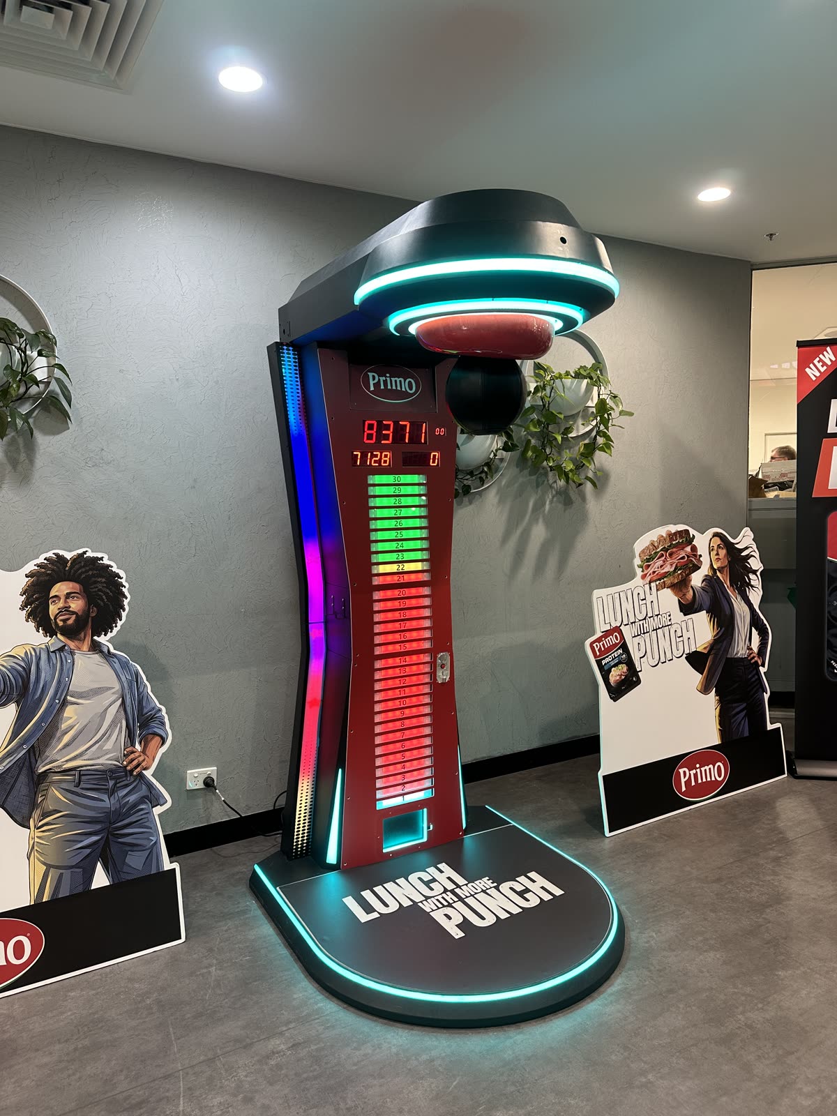 Coles × Primo — Lunch With More Punch — custom branded boxing / punch machine by Gametime Hire
